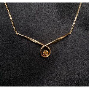 Vintage Gold-Tone Rhinestone Necklace With Elegant Loop Pendant Design